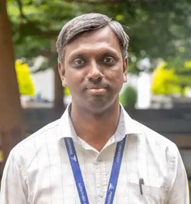 Dr. Manikandan T